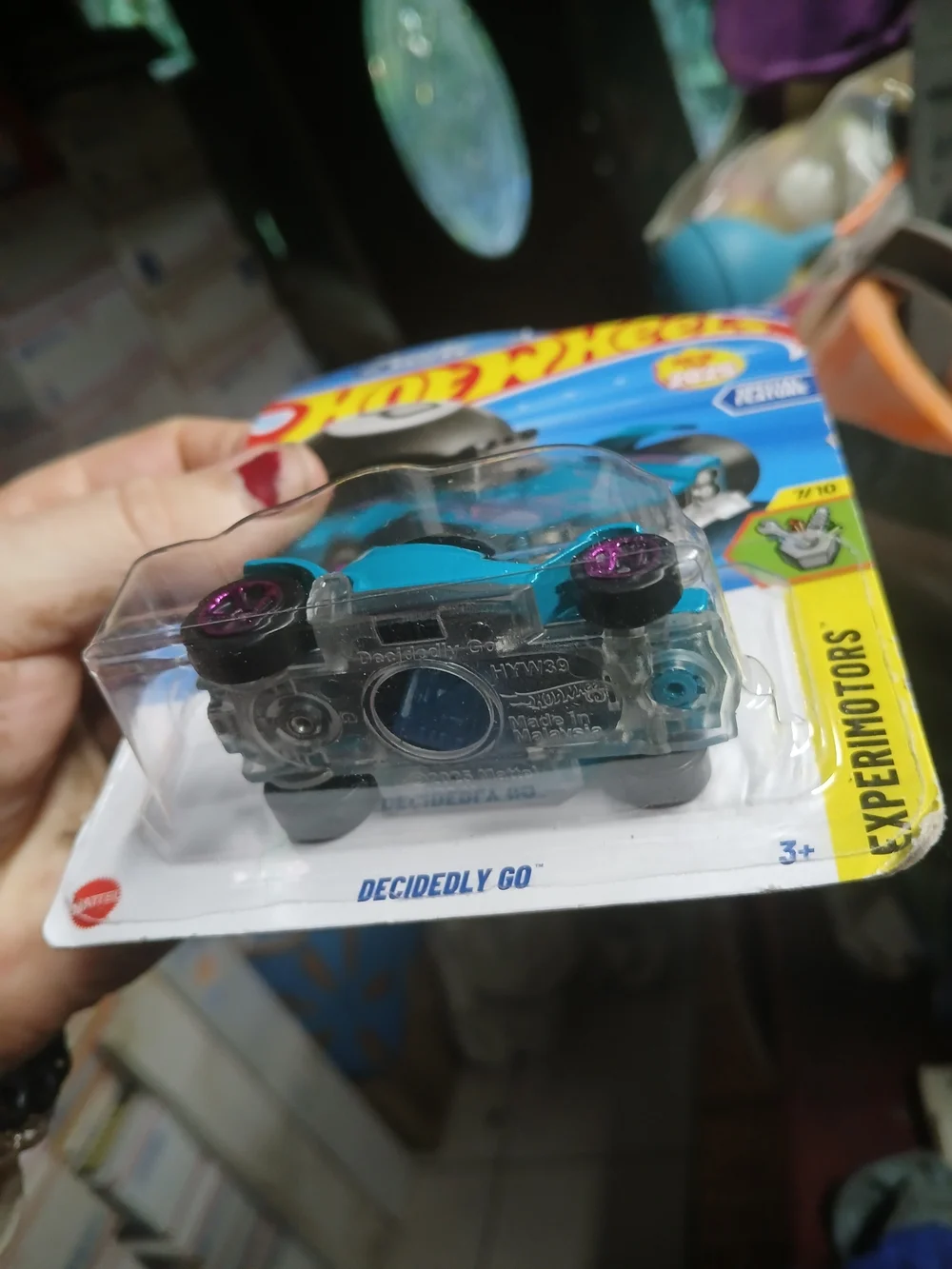 teal Hot Wheels Decidedly Go features a functional Magic 8 Ball design from the